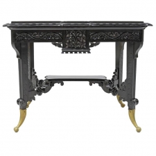 Aesthetic Movement Centre Table in Carved Ebonized Wood with Brass Feet